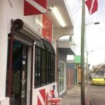 dive shop with dive flags in cozumel, Mexico
